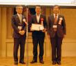 （左から）情報処理学会西尾会長、荒川氏、IEEE-CS笠原会長